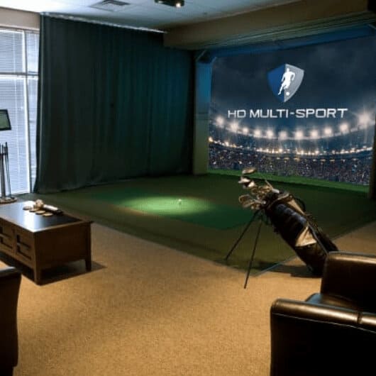 HD Golf simulator system with golf club set inside an indoor golf facility