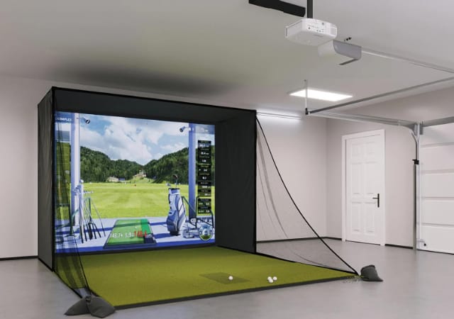Complete indoor Uneekor QED SIG10 Golf Simulator setup