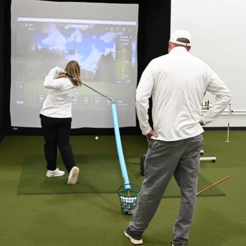 golf sim with coach
